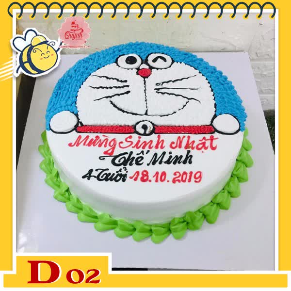 Bánh kem Doremon D02 nửa mặt doremon viền xanh lá dễ thương ở đế bánh