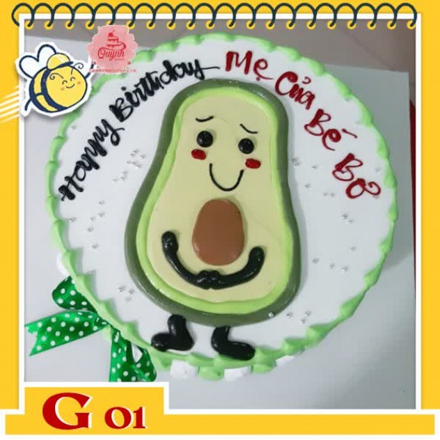 giới thiệu tổng quan Bánh kem bé gái G01 quả bơ hình người nền trắng viền xanh bơ thắt nơ xanh