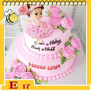 Bánh kem búp bê E17 váy hồng ngồi trên bánh 2 tầng nhiều bông hoa màu hồng xinh xắn