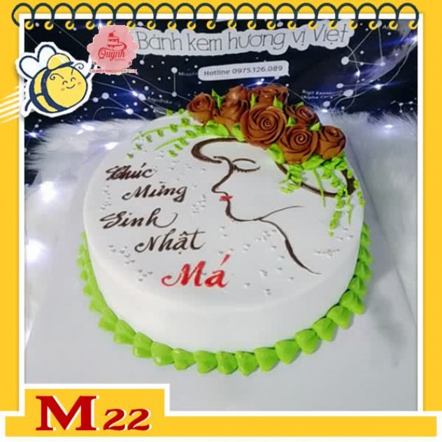 giới thiệu tổng quan Bánh kem tặng mẹ M22 nền trắng vẽ khuôn mặt người phụ nữ đội vòng hoa màu xanh lá và nâu lạ mà đẹp